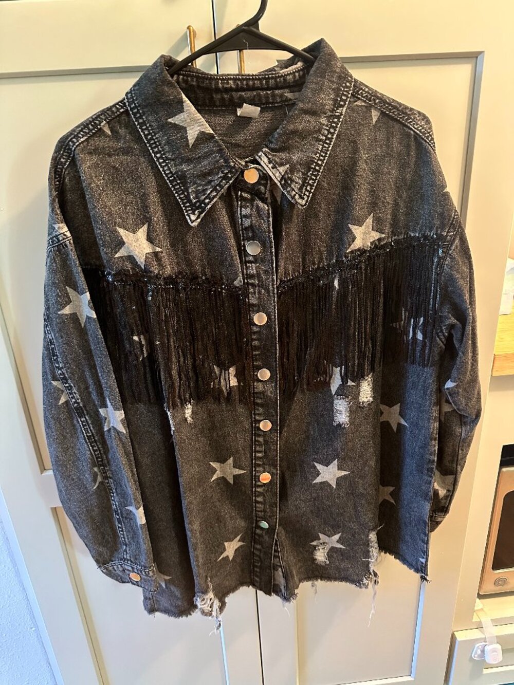 Dark grey wash shacket with stars and tassles size large